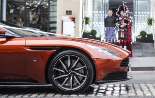 bagpiper, car launch, VIP, supercar