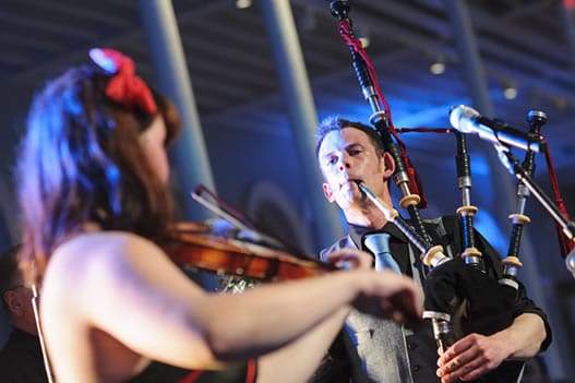 professional bagpiper in modern ceilidh band 